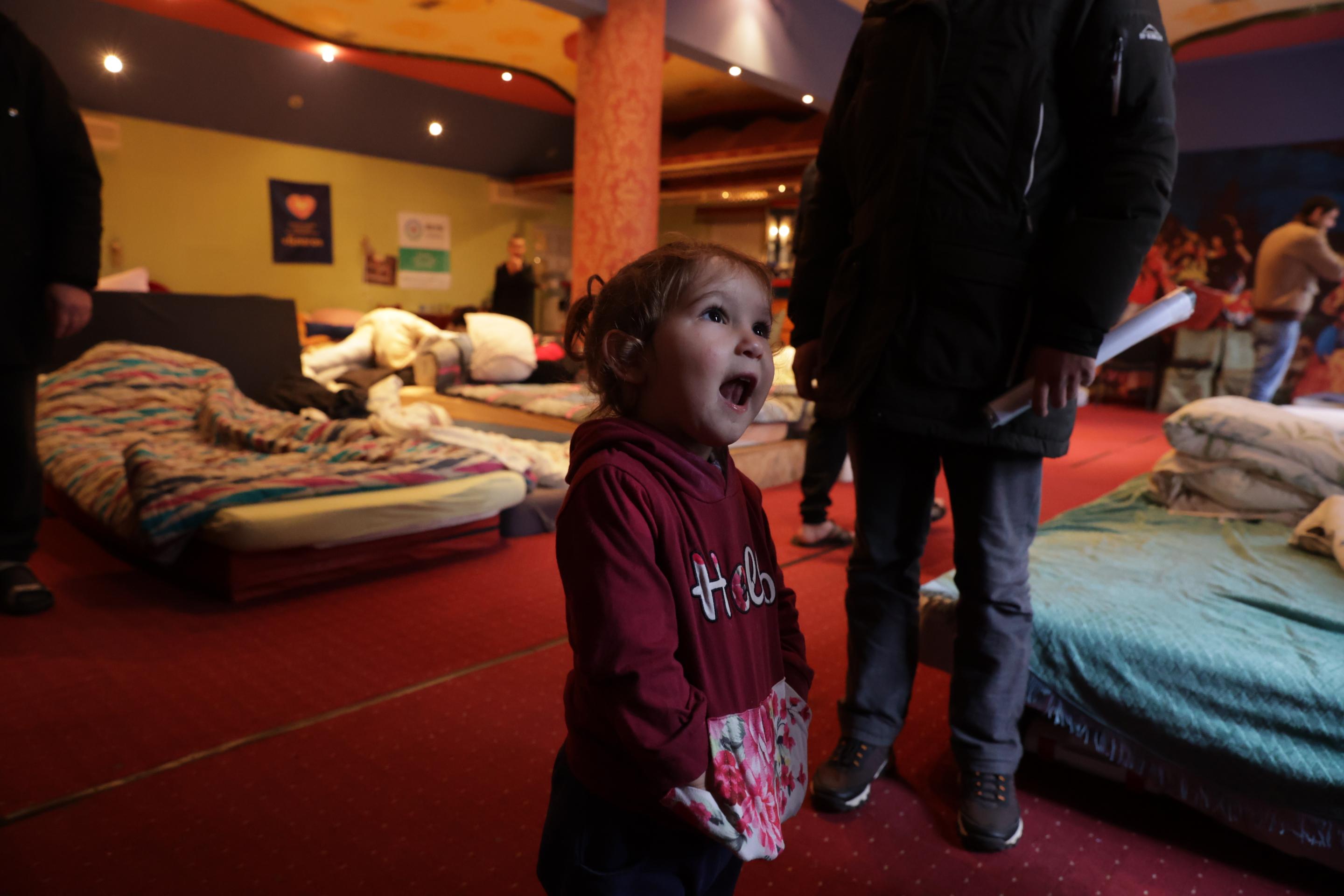 A young girl in a shelter