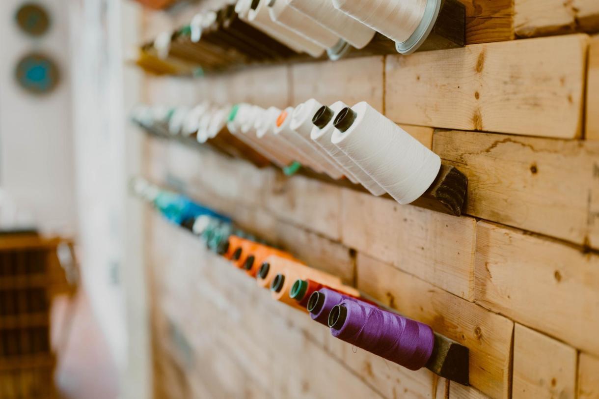 A collection of colorful yarn in sewing section