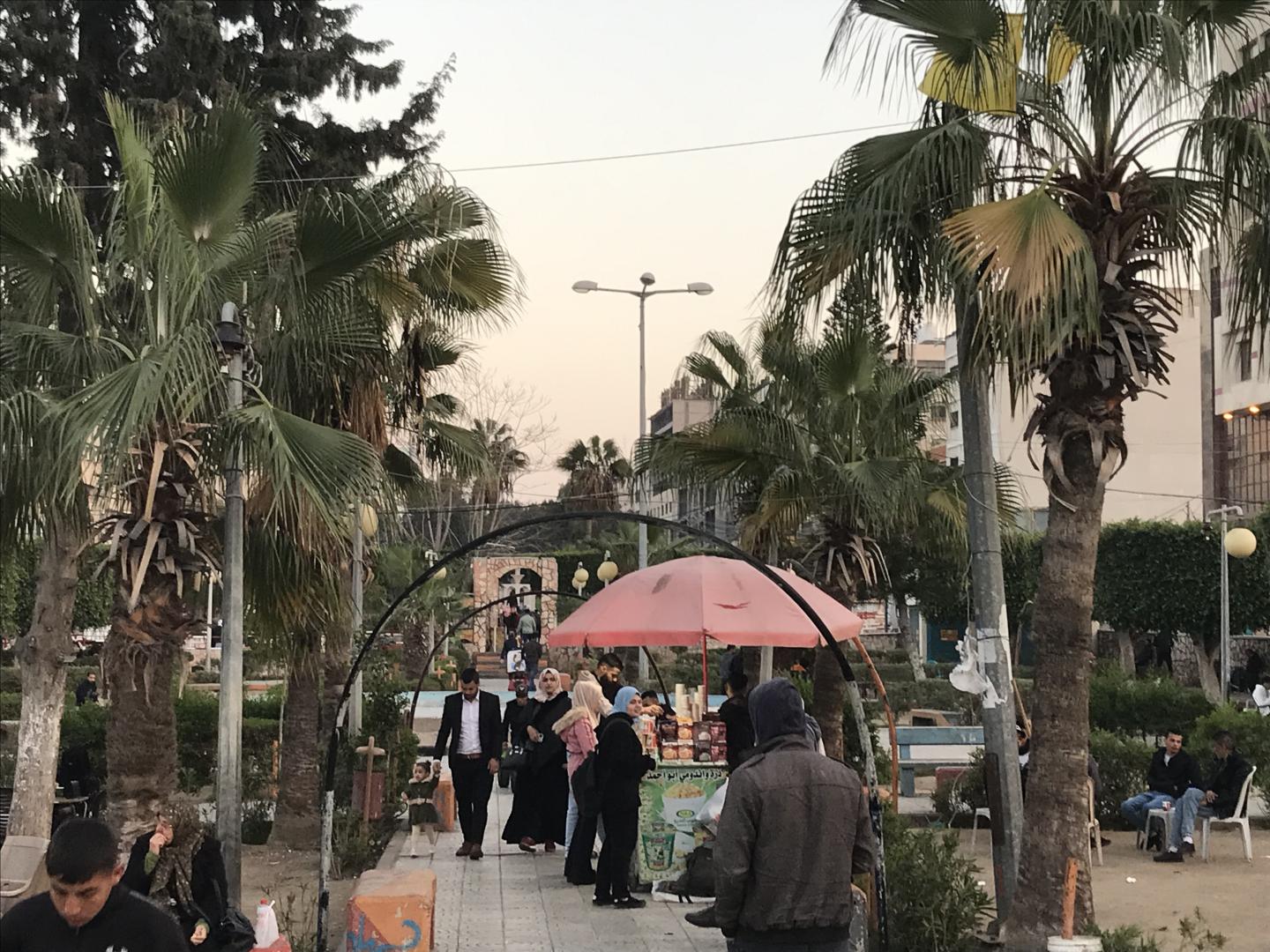 Families walking in a town square