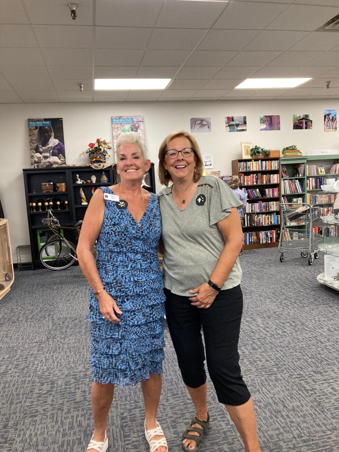 Judy Miller (left) and Rose Shetler (right) celebrate the grand opening of Thrift at Woodland Crossing in south-central Elkhart, Ind., on August 18, 2022.