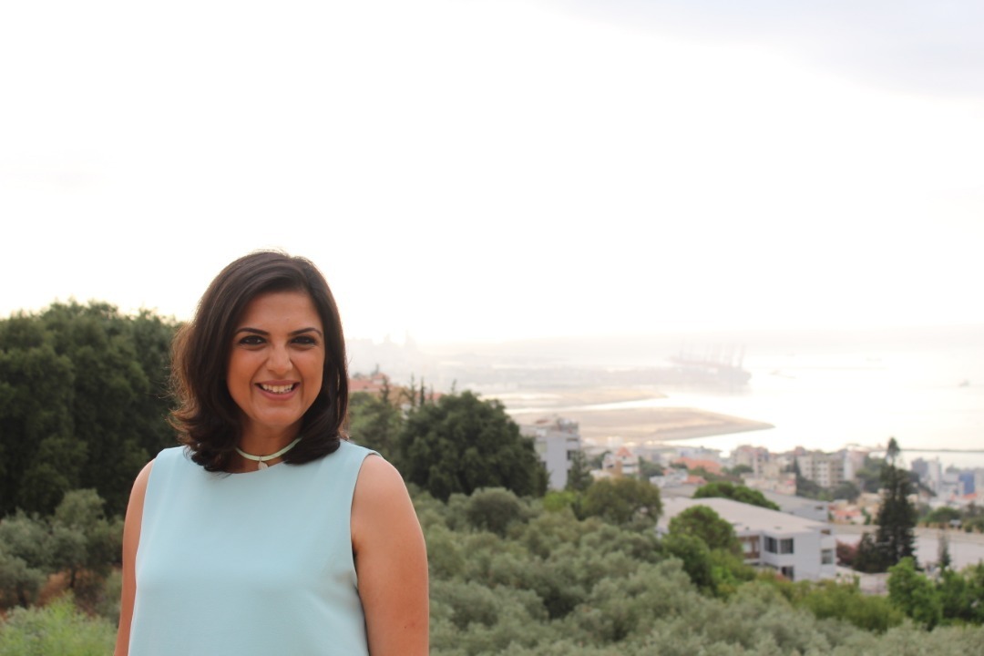 A woman smiling for a photo