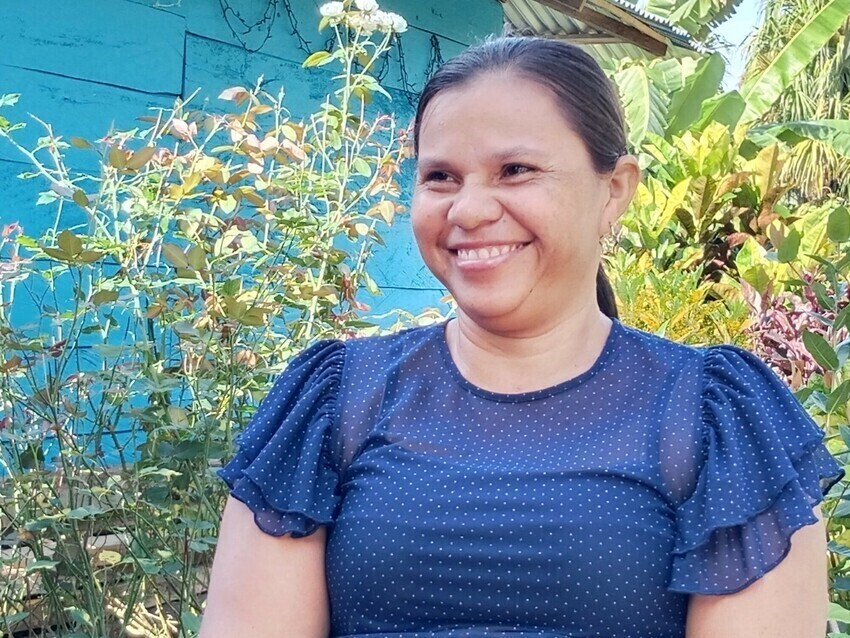 A woman smiling for a photo