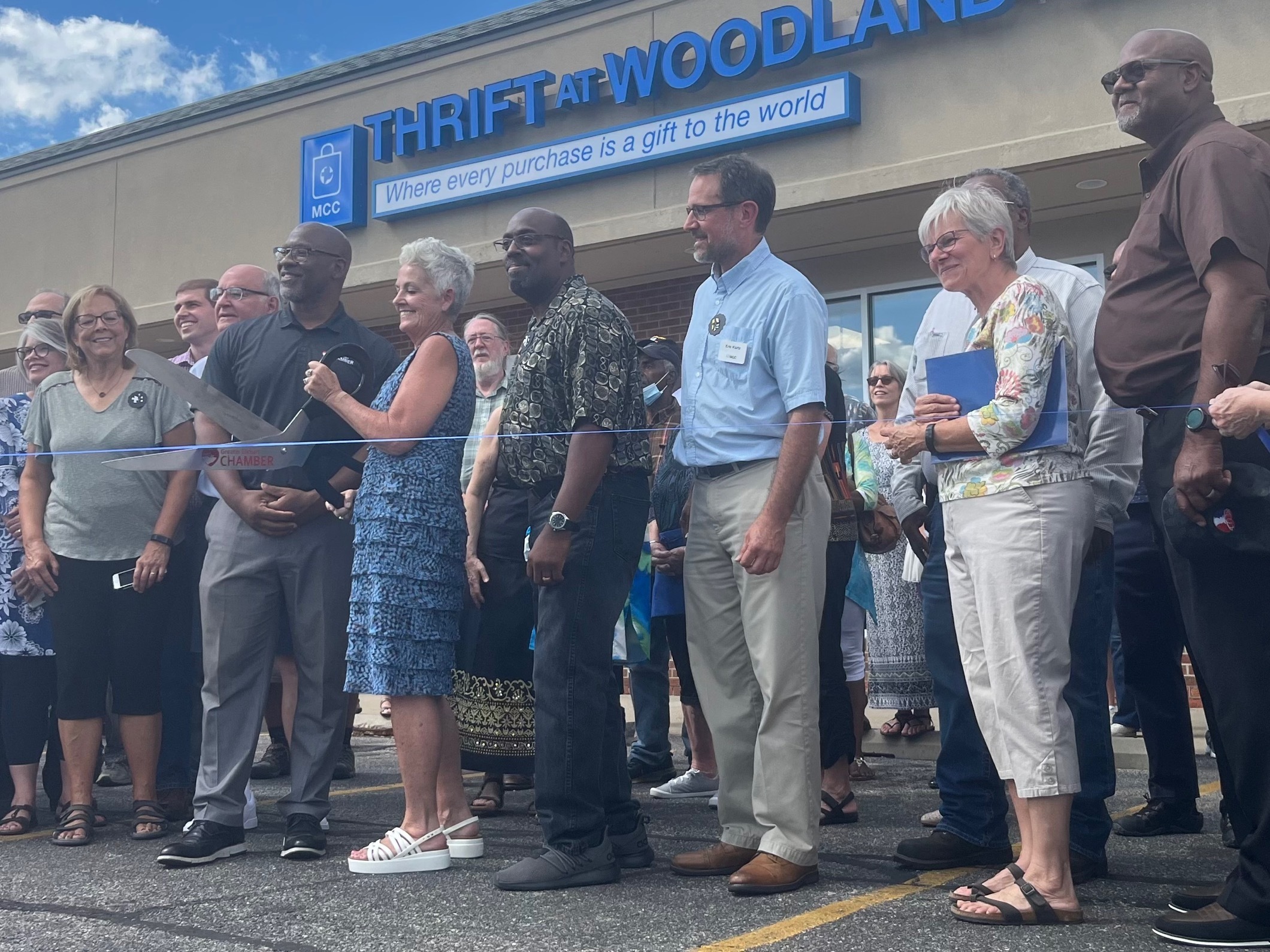 Ribbon cutting at Woodland store