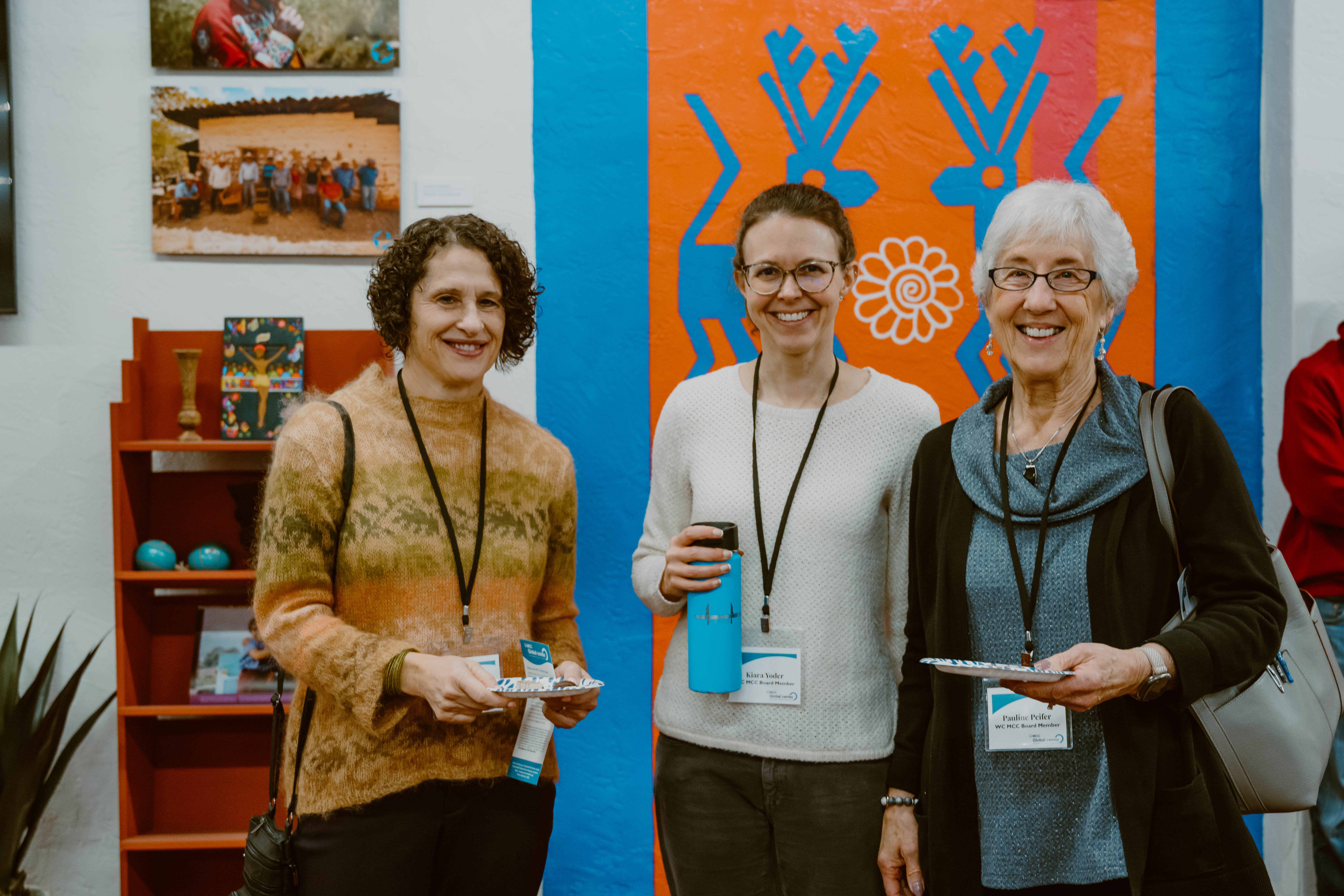 West Coast MCC Board members Nancy, Kiara, and Pauline, pose for a photo during the grand opening celebration of the MCC Global Center.