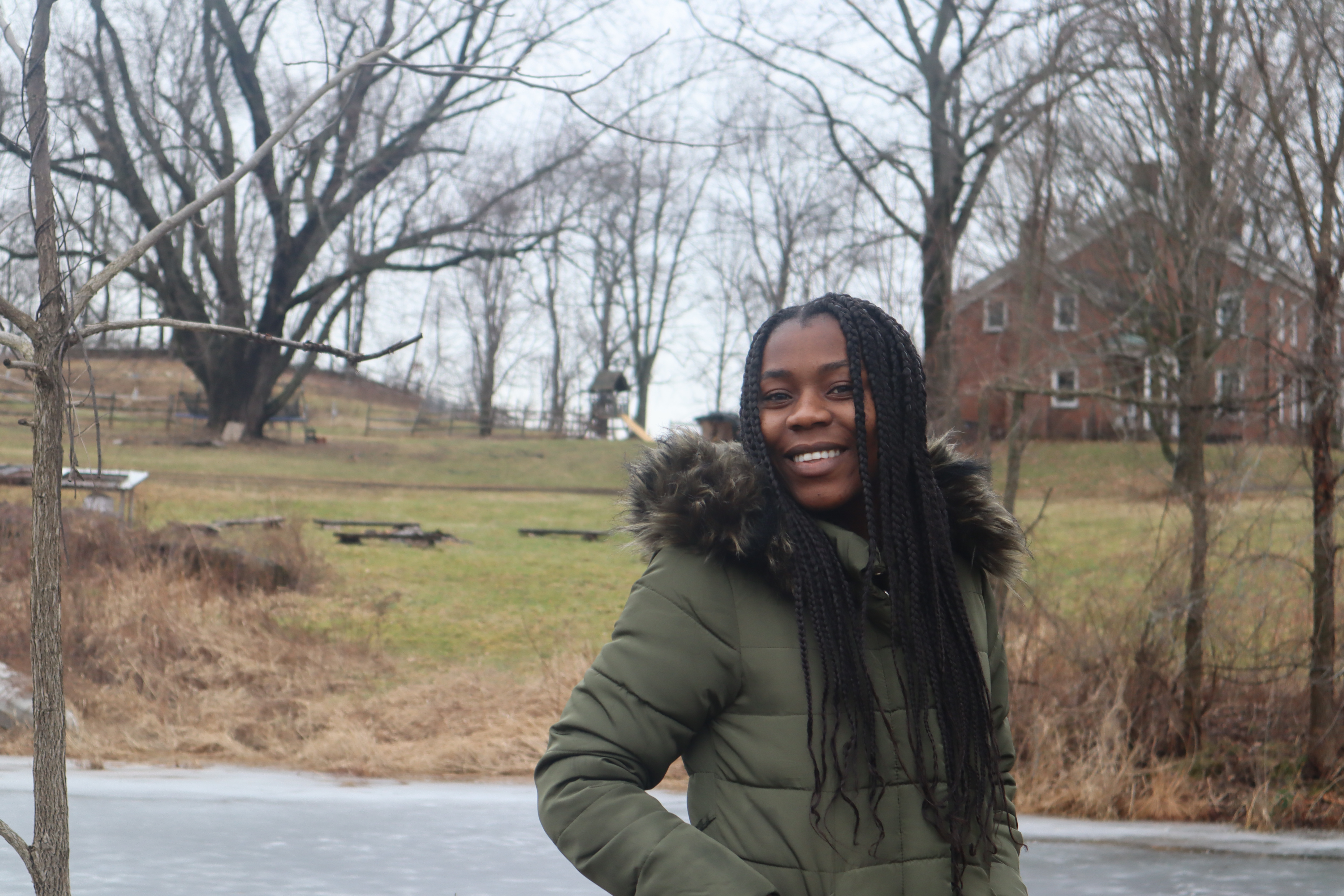 A person smiles at the camera. 