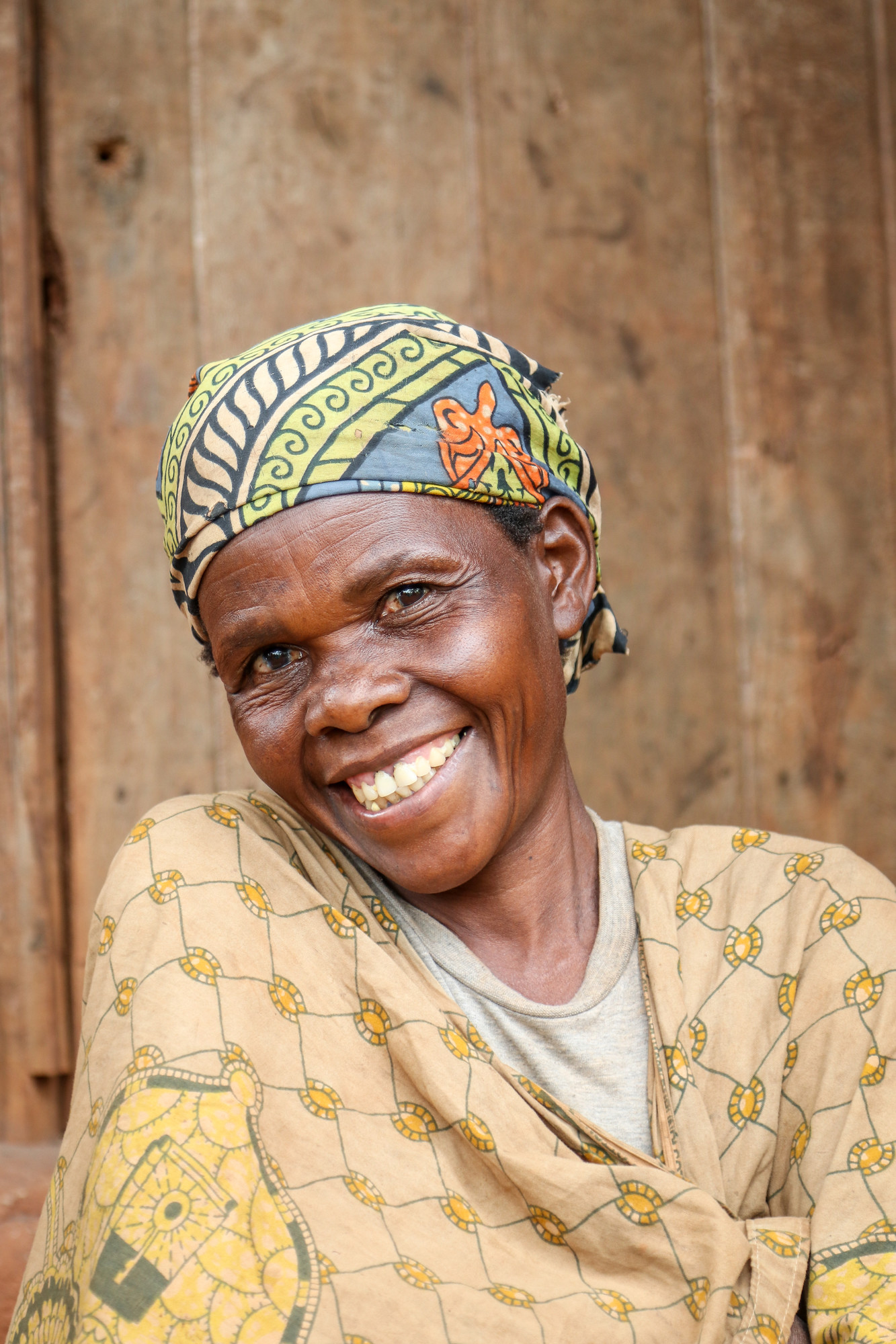 A portrait of a Burundi woman smiling