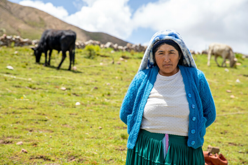 A woman standing in a field