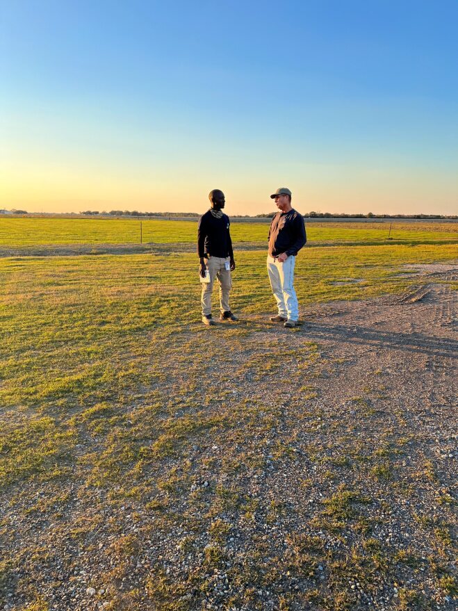 Jack Odhiambo discusses different techniques and equipment used for rice farming with the Owner of Hetzel Farm, Glen Hetzel. Hetzel gave a tour of the equipment they use around the farm.