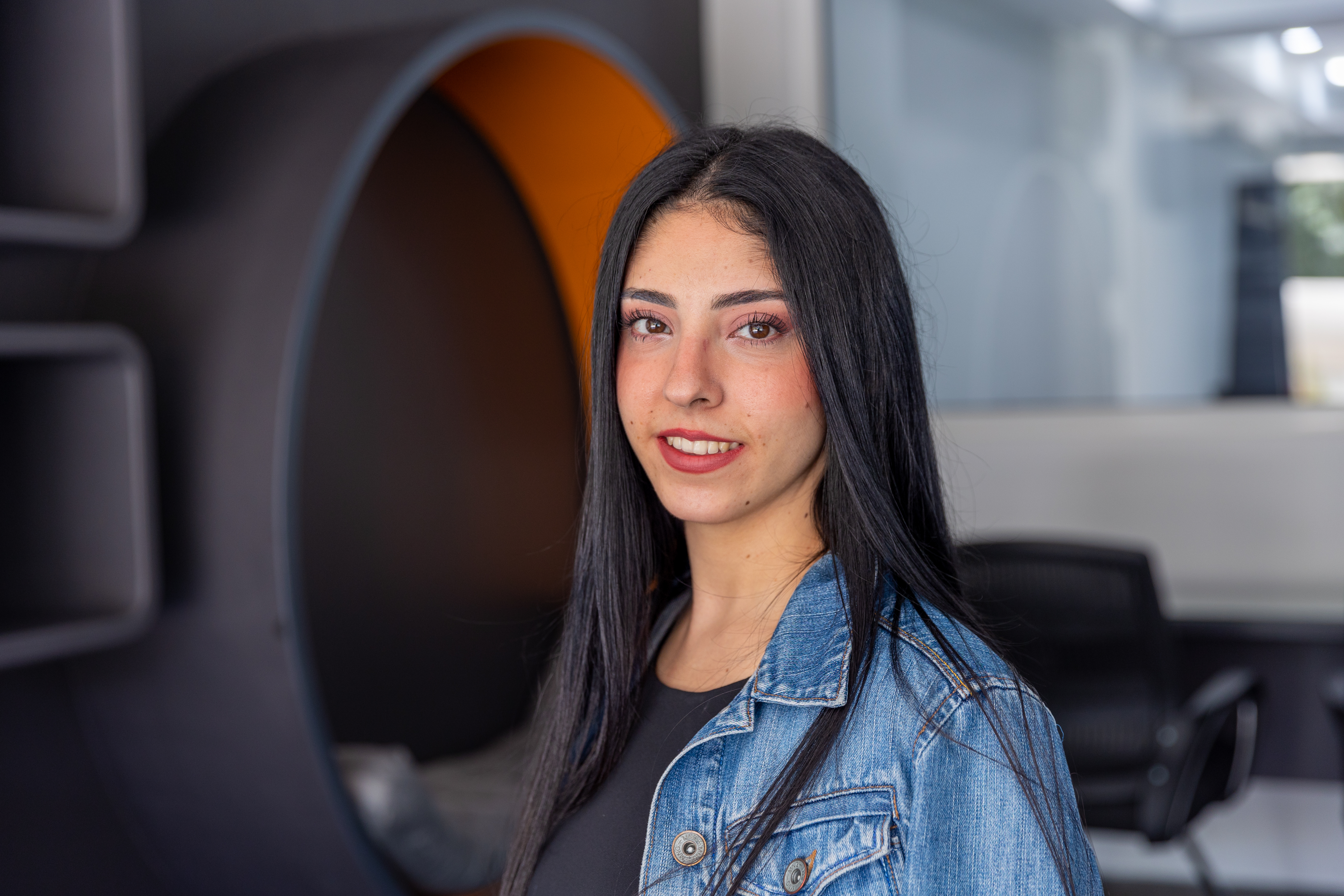 Nour Mardini pauses for a photo at Aleppo Development Impact and Support Center (ADISC) in Aleppo, Syria.