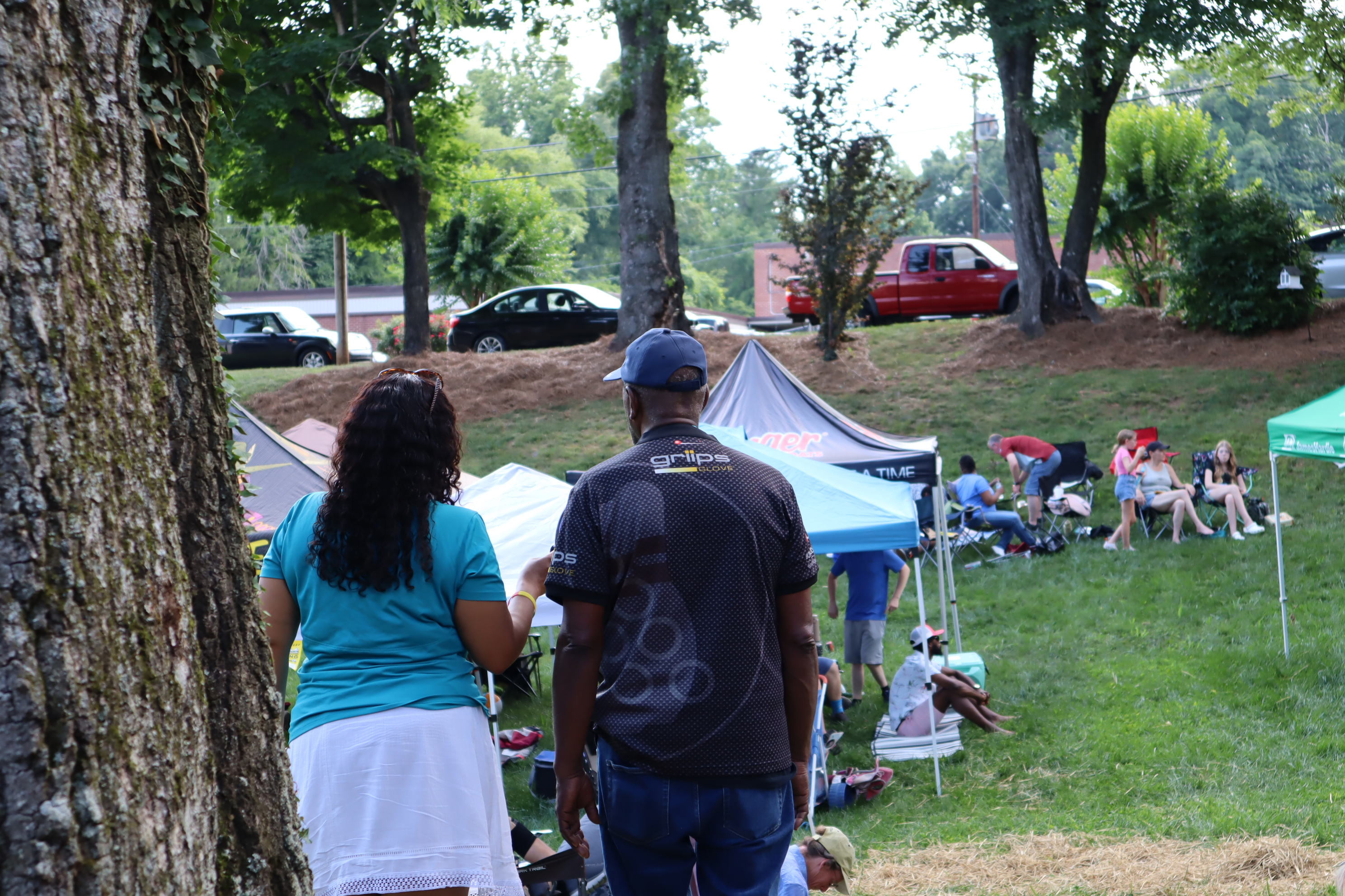 Hyacinth Stevens, MCC EC executive director and EC board member Clyde Ferguson, Jr. during the backyard music concert for MCC in Elkin, North Carolina.