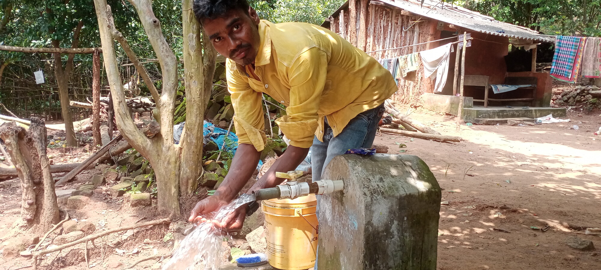 Man washing his hands with clean water.