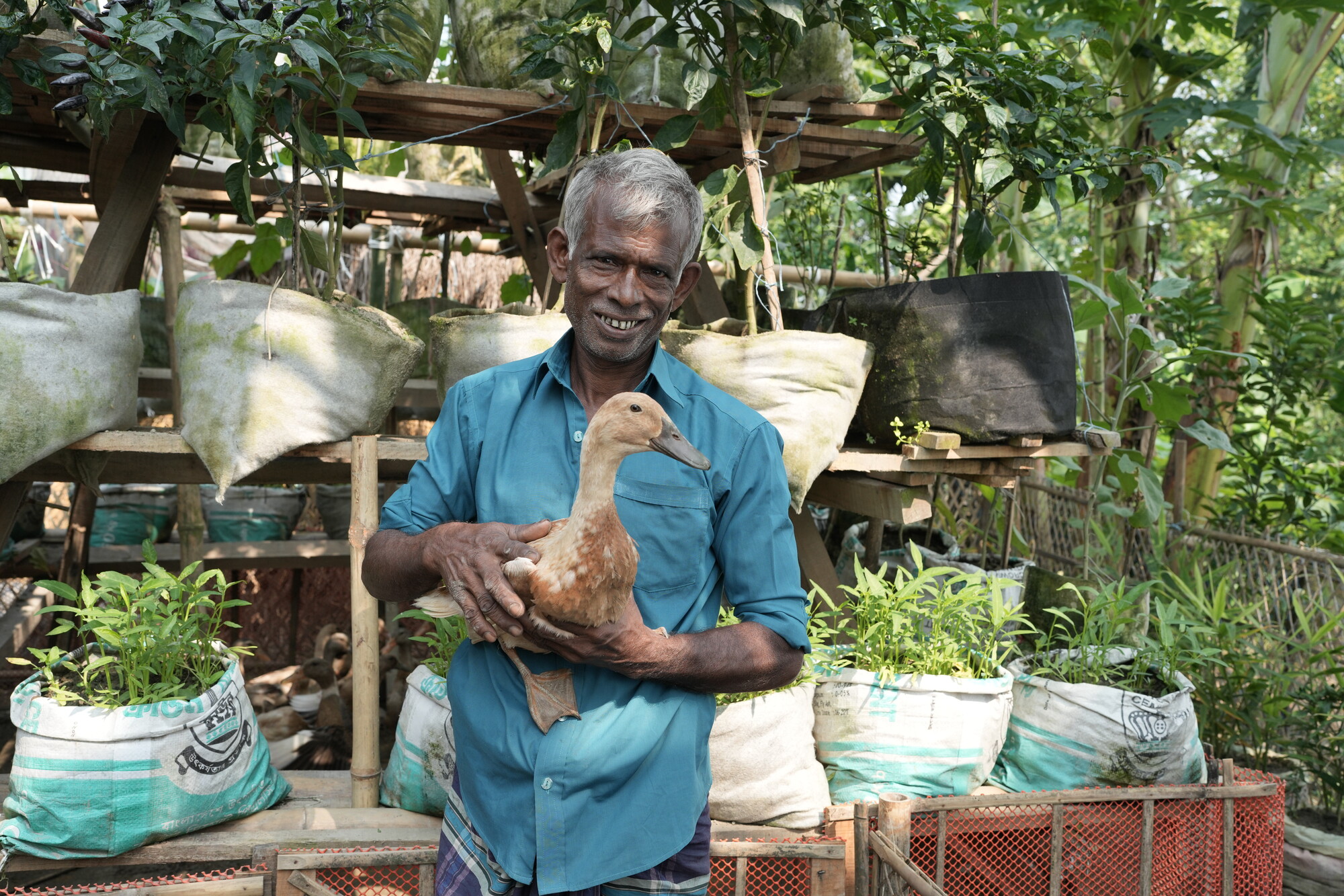 Man holding a duck.