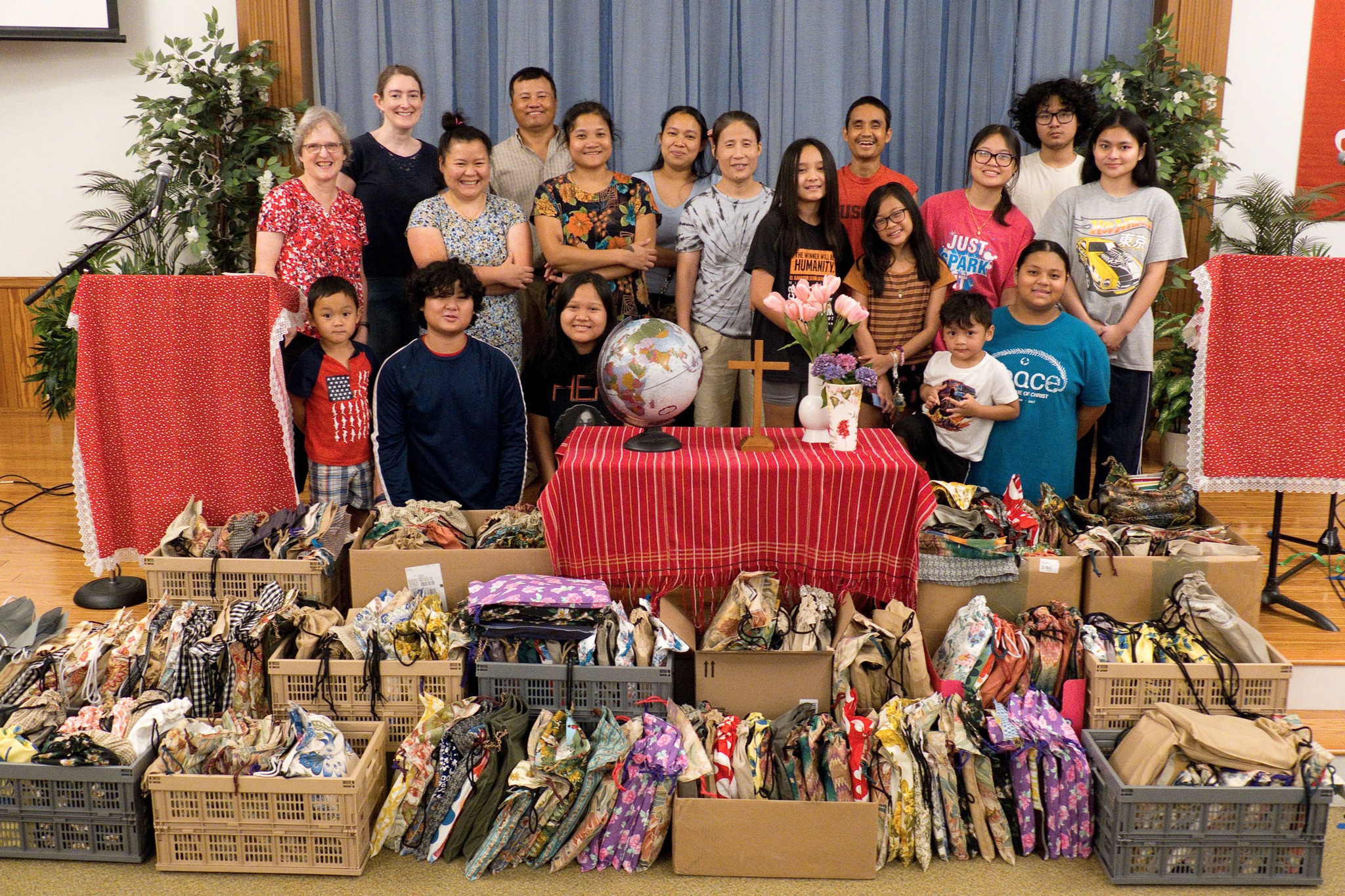 Members from a church pack school kits for MCC's School Kit Challenge.