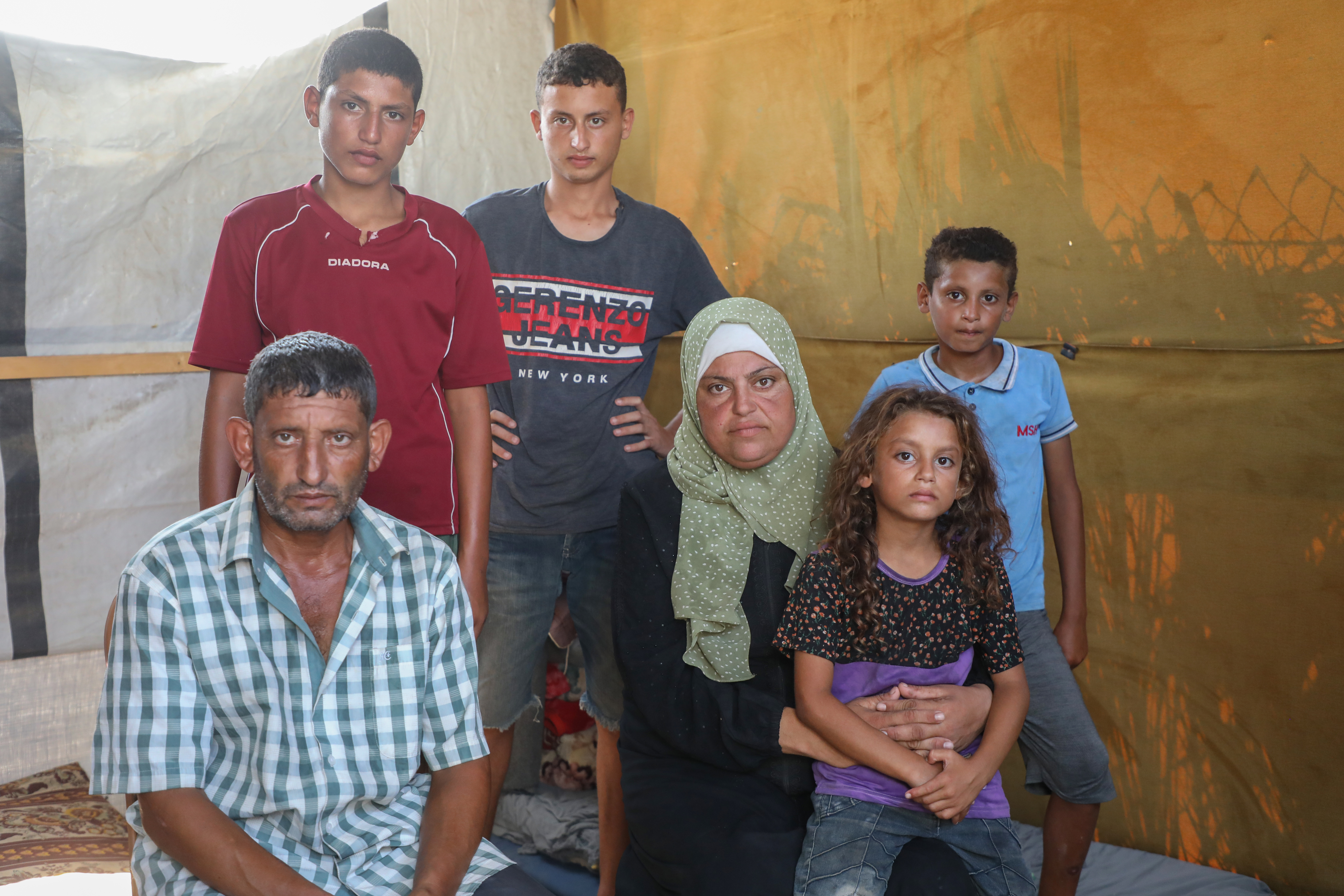 Family inside tent