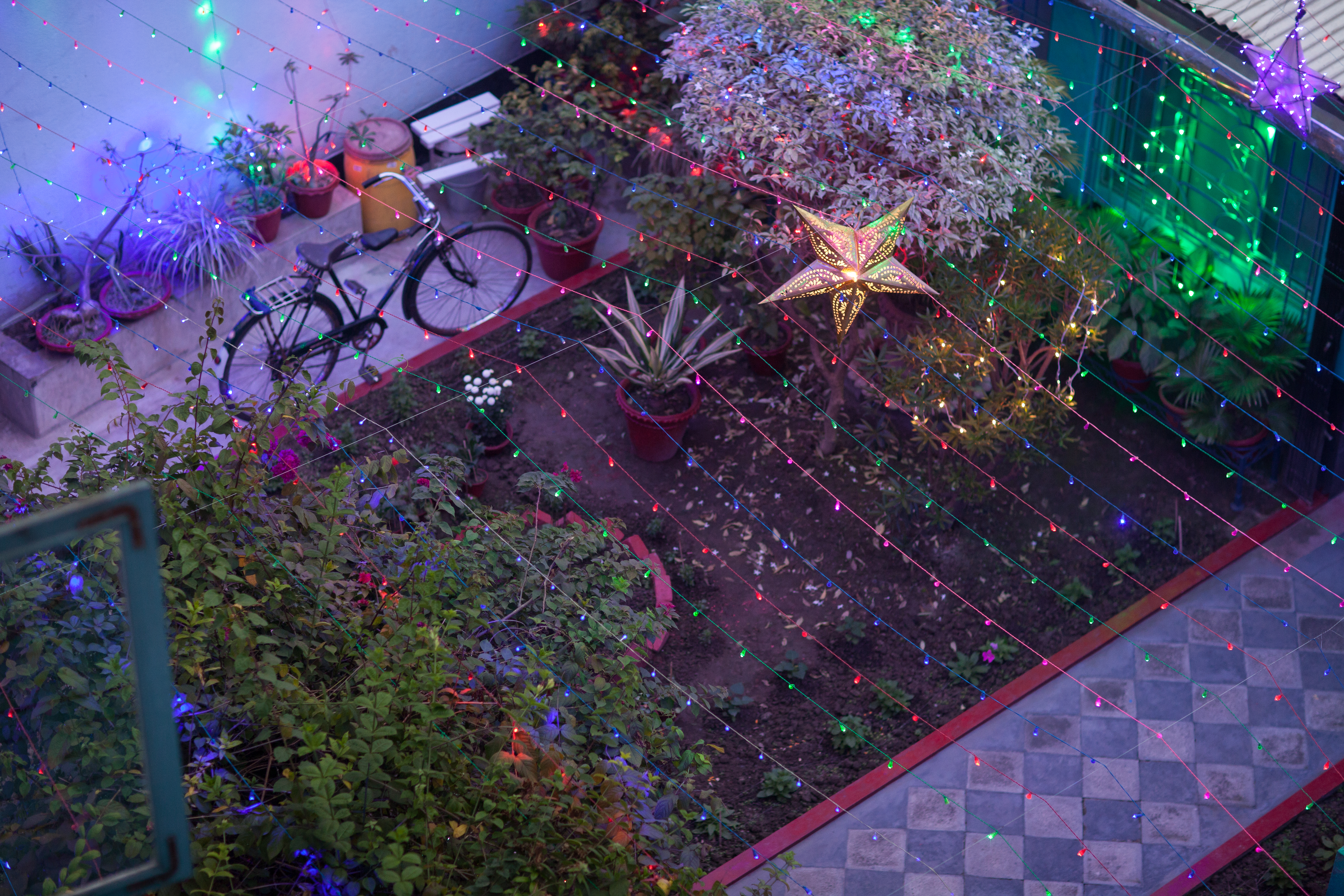 Christmas lights and decorations in a court yard