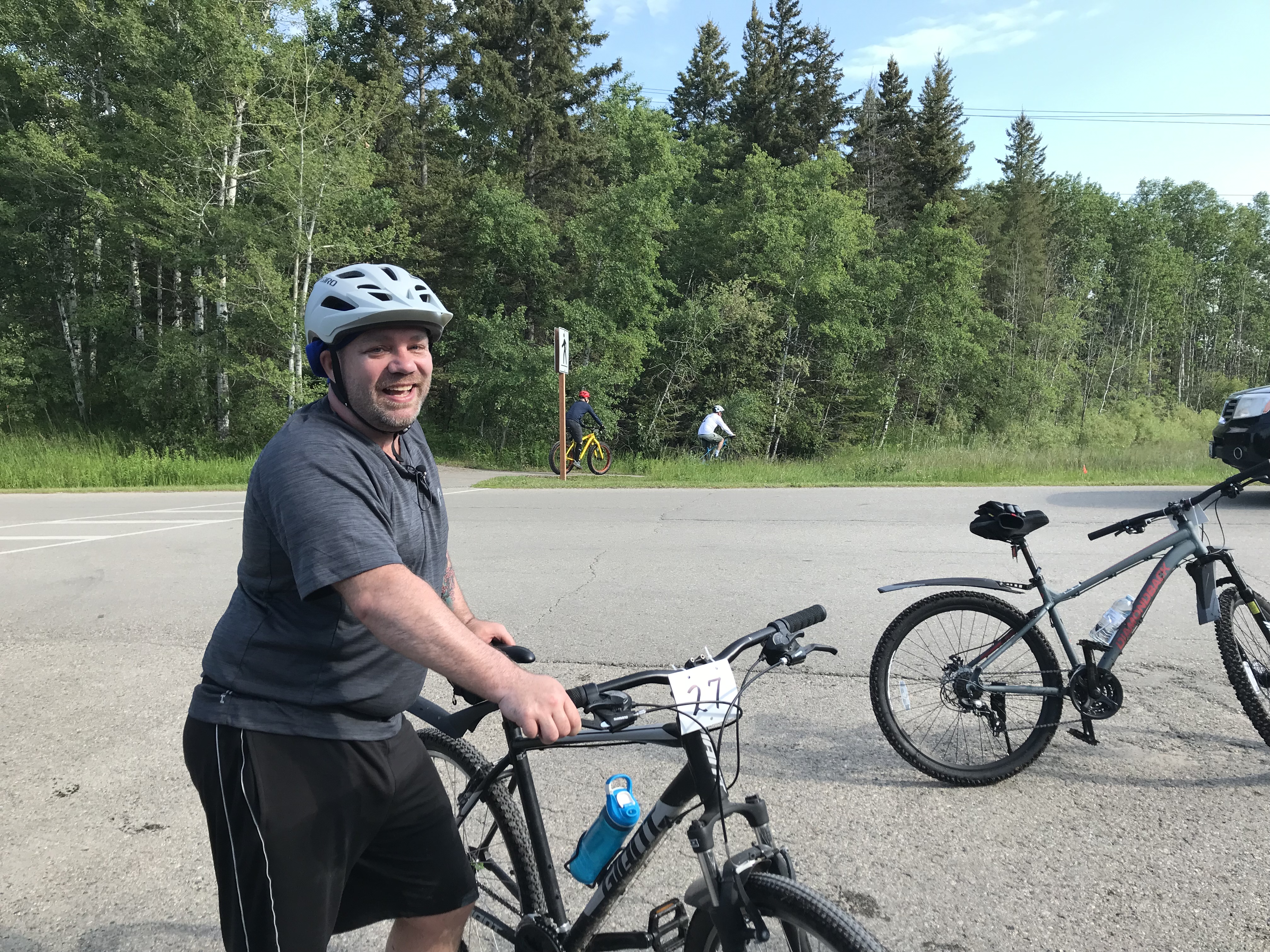 Kyle Rudge with his bike at Cycle Clear Lake