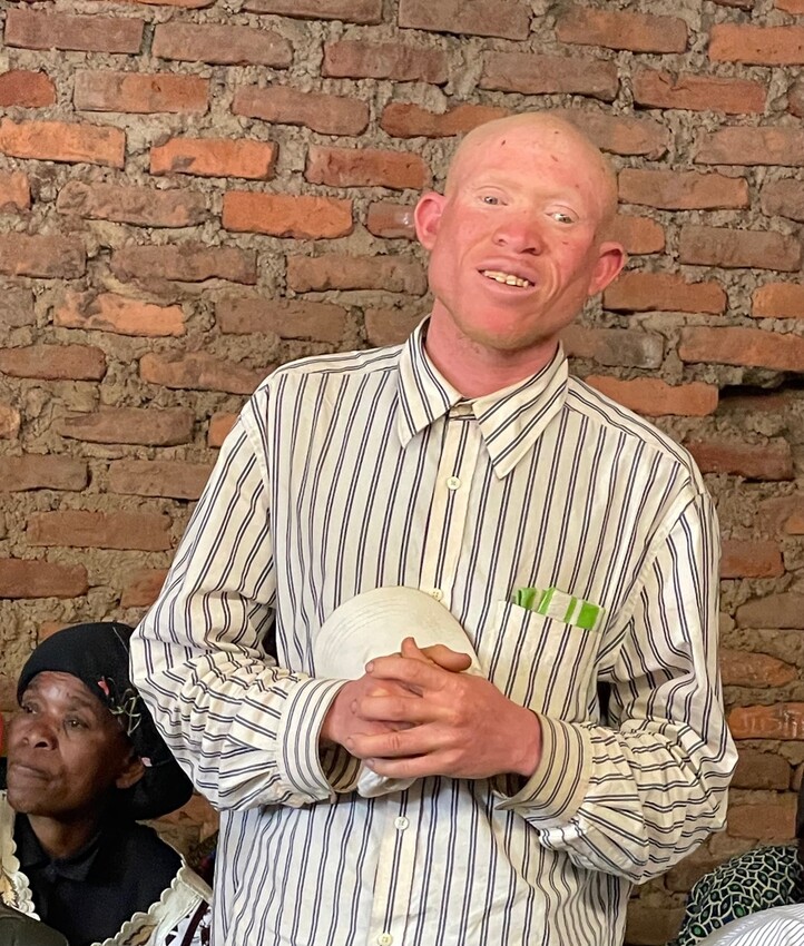 A man smiling at the camera.