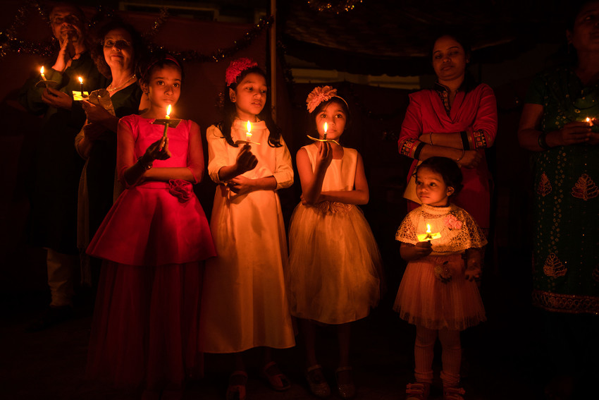 MCC staff, along with their families, celebrated Christmas 2017 at MCC's office in Kolkata, India. Children pictured from left, Brishti Ghosh, Rachel Das, Reyana Kader and Angelina Hazra. (MCC photo/C