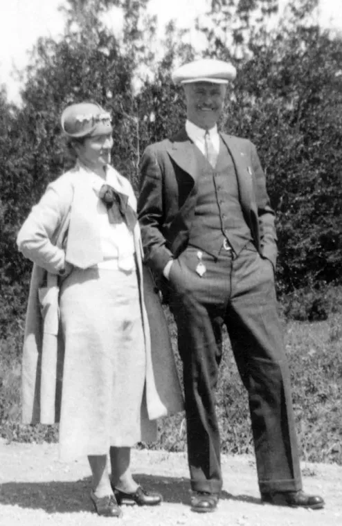 Jacob and Anna Funk standing on a street corner.