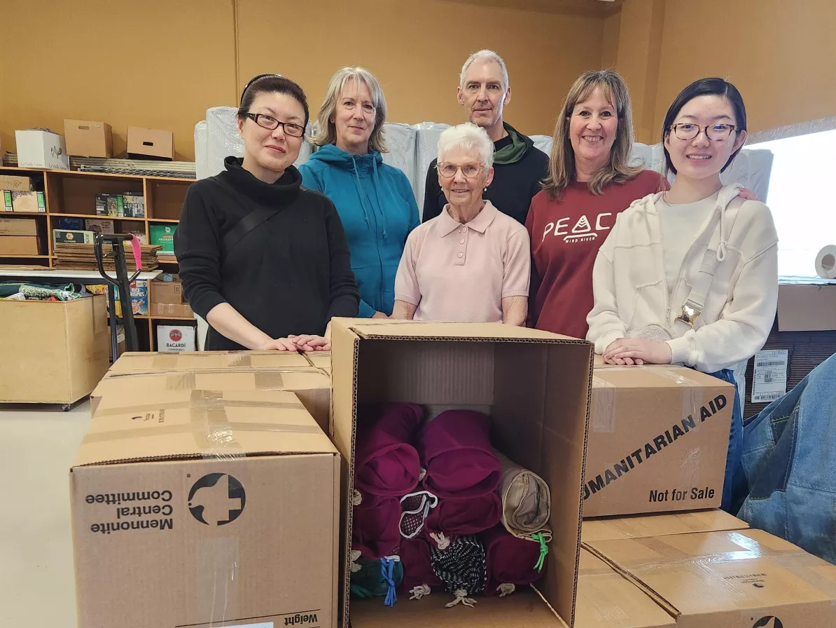 a group of volunteers at Alberta's Material Resources Warehouse