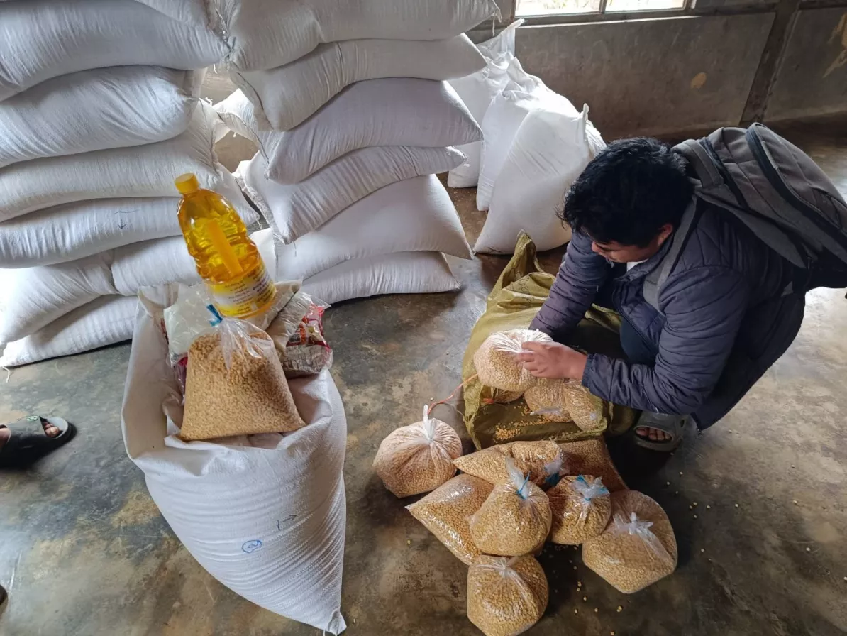 MCC-supported food parcels are prepared for distribution to internally displaced people in Myanmar.