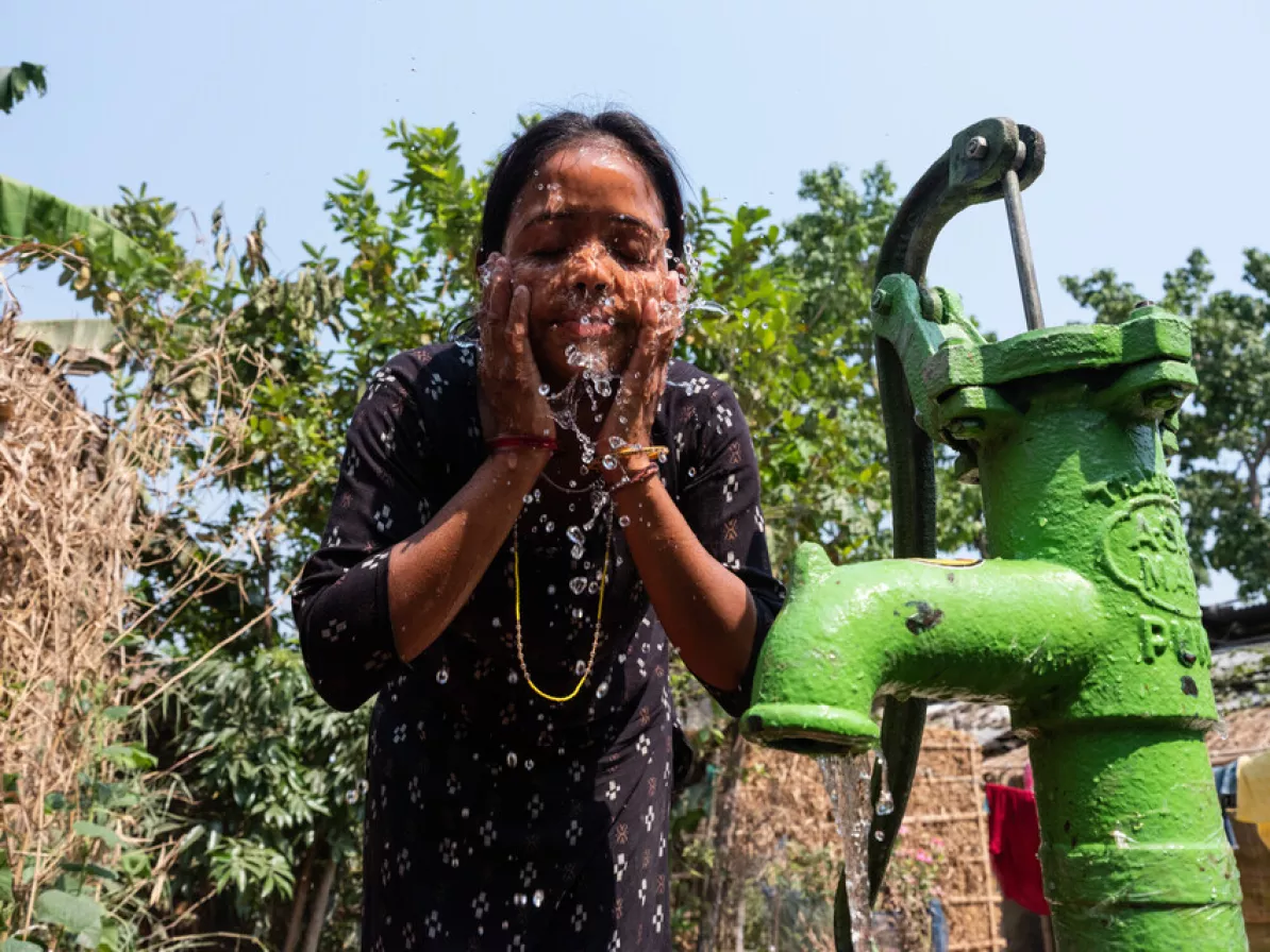 Deepa Mandal Paswan (22) washes her face with water from the recently constructed borewell by SAHAS with support from the MCC in Jahada Rural Municipality-2, Morang, Nepal, on Thursday, April 25, 2024