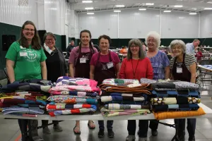 The 2022 Ohio Comforter Bash local committee put in many hours planning and hosting the event. (Left to right) Sarah Doerksen (MCC Great Lakes Ohio Material Resources Coordinator), Amy Stauffer-McNutt