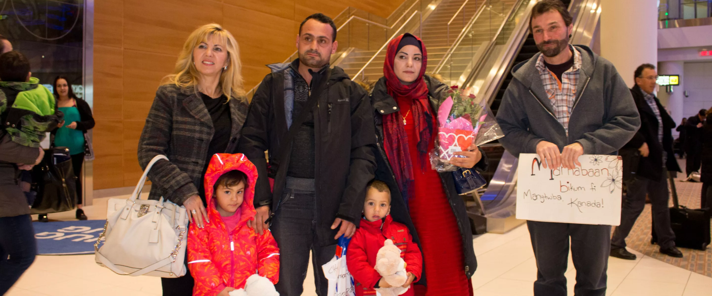 (From left) Fata Muheljic, Reyad Alhamoud, Najwa Hussein Al Mohamad, Paul Waldner, and children, (front) Raghad and Ali. 
	
	Elaine Hofer and Paul Waldner are members of Green Acres Colony, near Wa