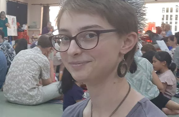 A young woman poses for a portrait