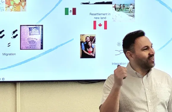 During an Addressing the Impact and Trauma of Migration seminar at MCC's Akron, Pennsylvania, campus, co-facilitator Saulo Padilla discusses various parts of a migrant's journey through the lens of hi