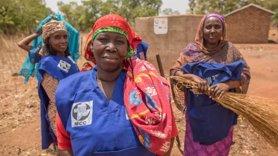 Three Chadian women in blue vests