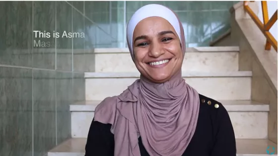 A Jordanian woman in a pink and white hijab