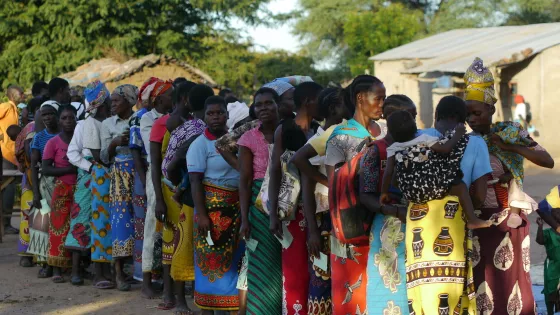 A group of Malawi women wait in a line