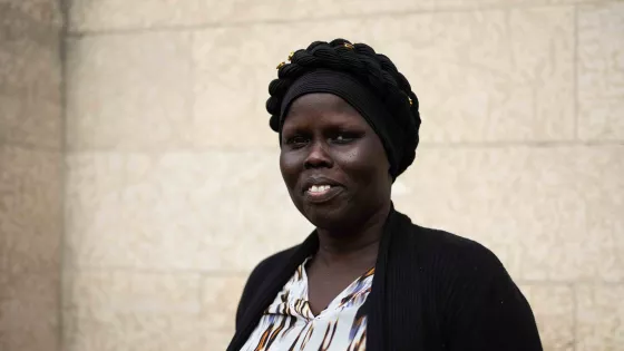 A woman smiling for a headshot