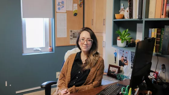 A woman at her desk in an office