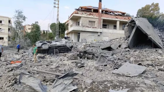 A destroyed home and street