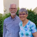 A man and woman smiling for a photo