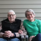 A man and woman smiling for a photo